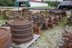 Old Wheels and axles laying on the yard